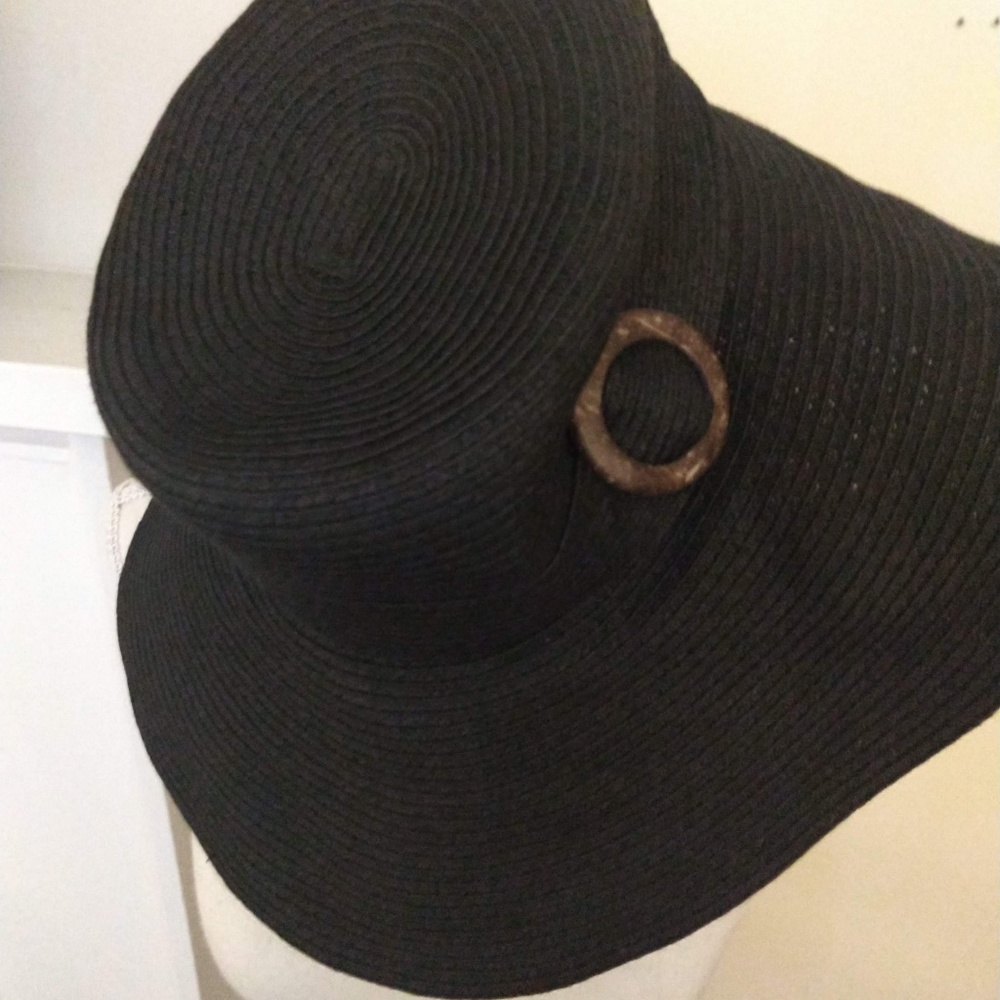 Wide brim floppy hat with wood buckle